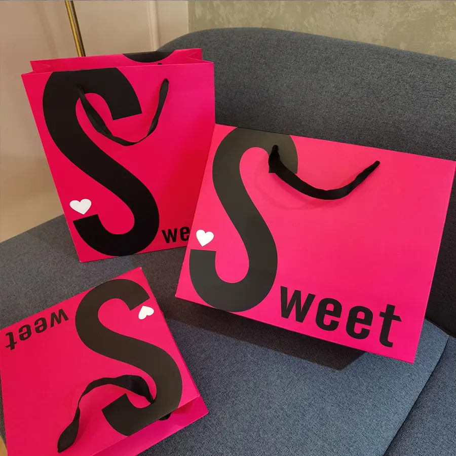 pink paper bag with black logo (2)