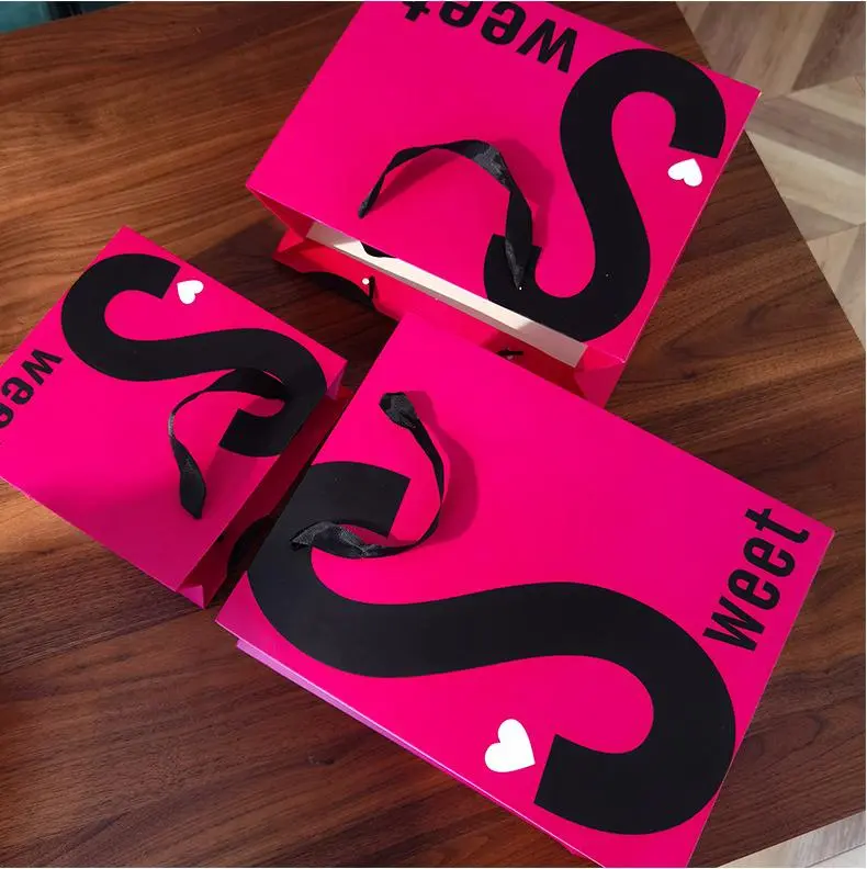 pink paper bag with black logo (3)