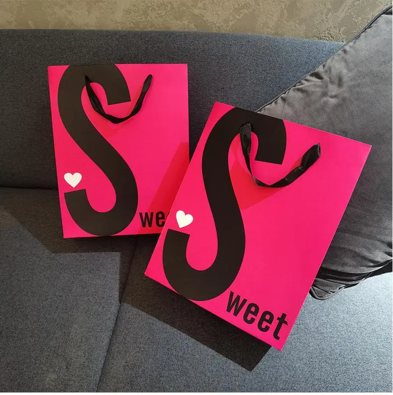 pink paper bag with black logo (4)