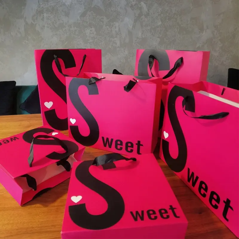 pink paper bag with black logo (8)