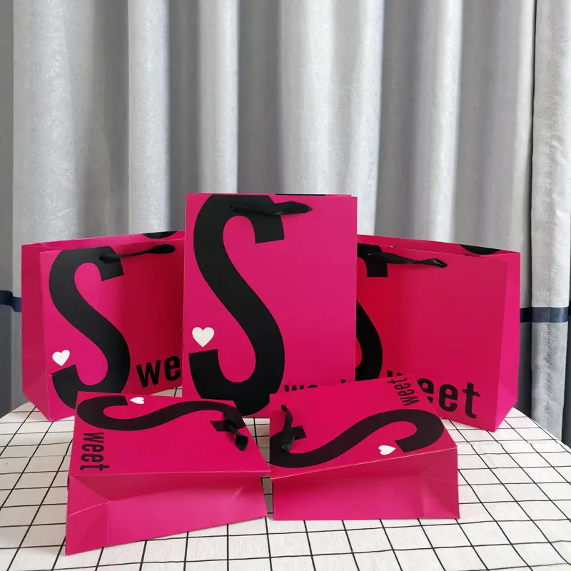 pink paper bag with black logo (9)